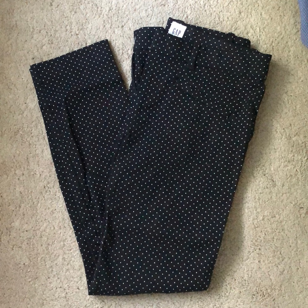 Black pants with white polkadots